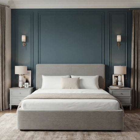 King size ottoman bed grey with upholstered headboard and footboard placed in the middle of a modern room