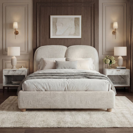 Front view of a king-size grey beige upholstered bed frame with curved headboard design, and warm bedside lighting