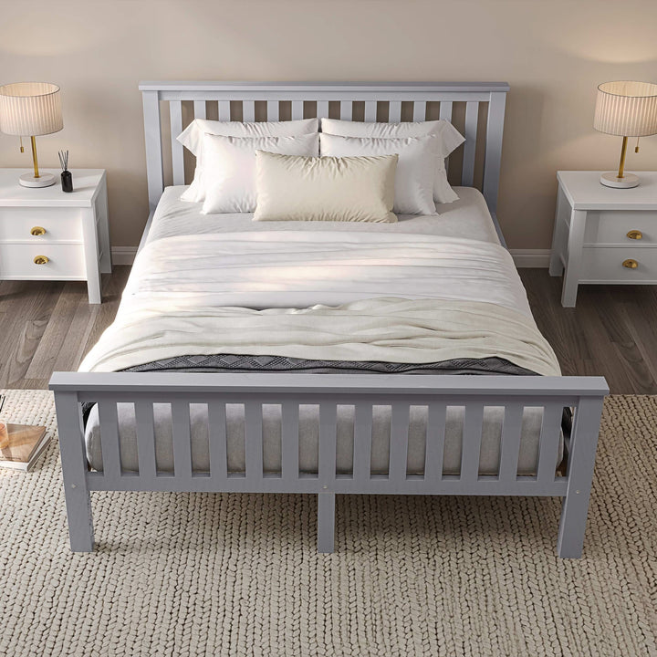 [Grey | King] Front view grey king size wooden bed frame flanked by two white bedsides with lit table lamps