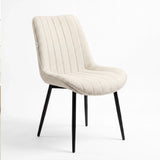 [Beige]  Kyvon beige upholstered fabric vertical dining chair angled view with black metal legs