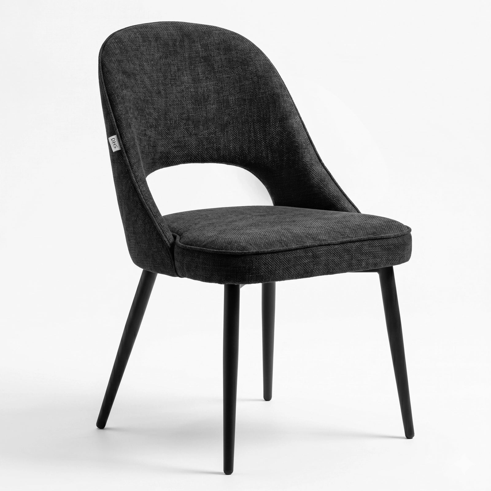 [Black | Clear] Kyvon black upholstered fabric comfy curve chair angled view with rounded back and cushioned seat