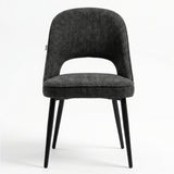 [Black | Clear] Kyvon black upholstered fabric comfy curve chair front view with rounded back and cushioned seat