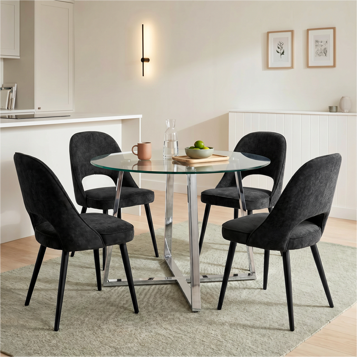 [Black | Clear] Kyvon round glass dining set with 110cm round table, chrome legs and 4 black chairs in a dining room