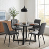 [Dark Grey | Black Wood] Kyvon round dining table set with 4 dark grey velvet chairs in a styled dining room