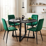 [Green | Black Wood] Kyvon round dining table set with 4 green velvet chairs in a dining room