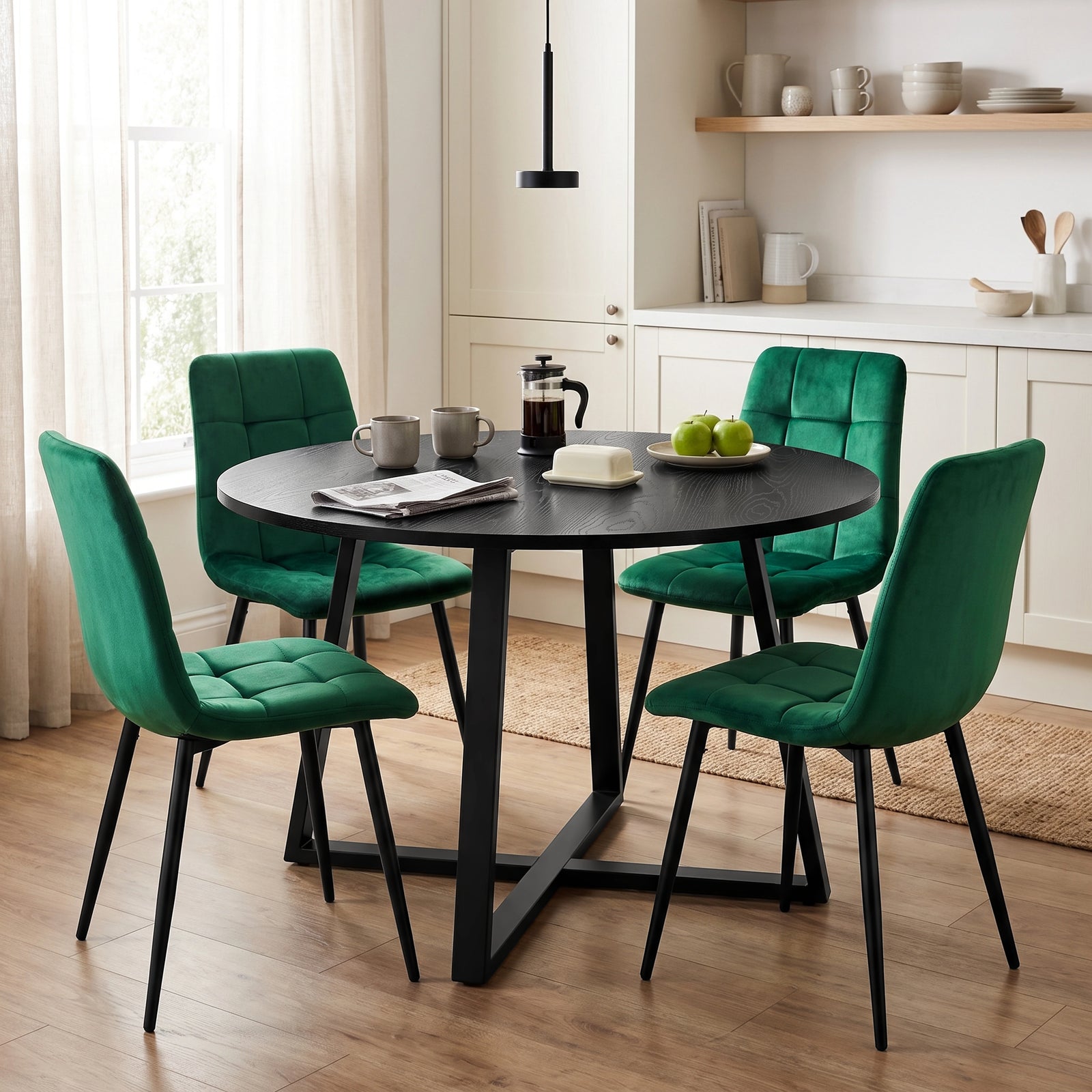 [Green | Black Wood] Kyvon round dining table set with 4 green velvet chairs in a dining room