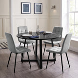[Light Grey | Black Wood] Kyvon round dining table set in panelled dining room with four light grey velvet chairs