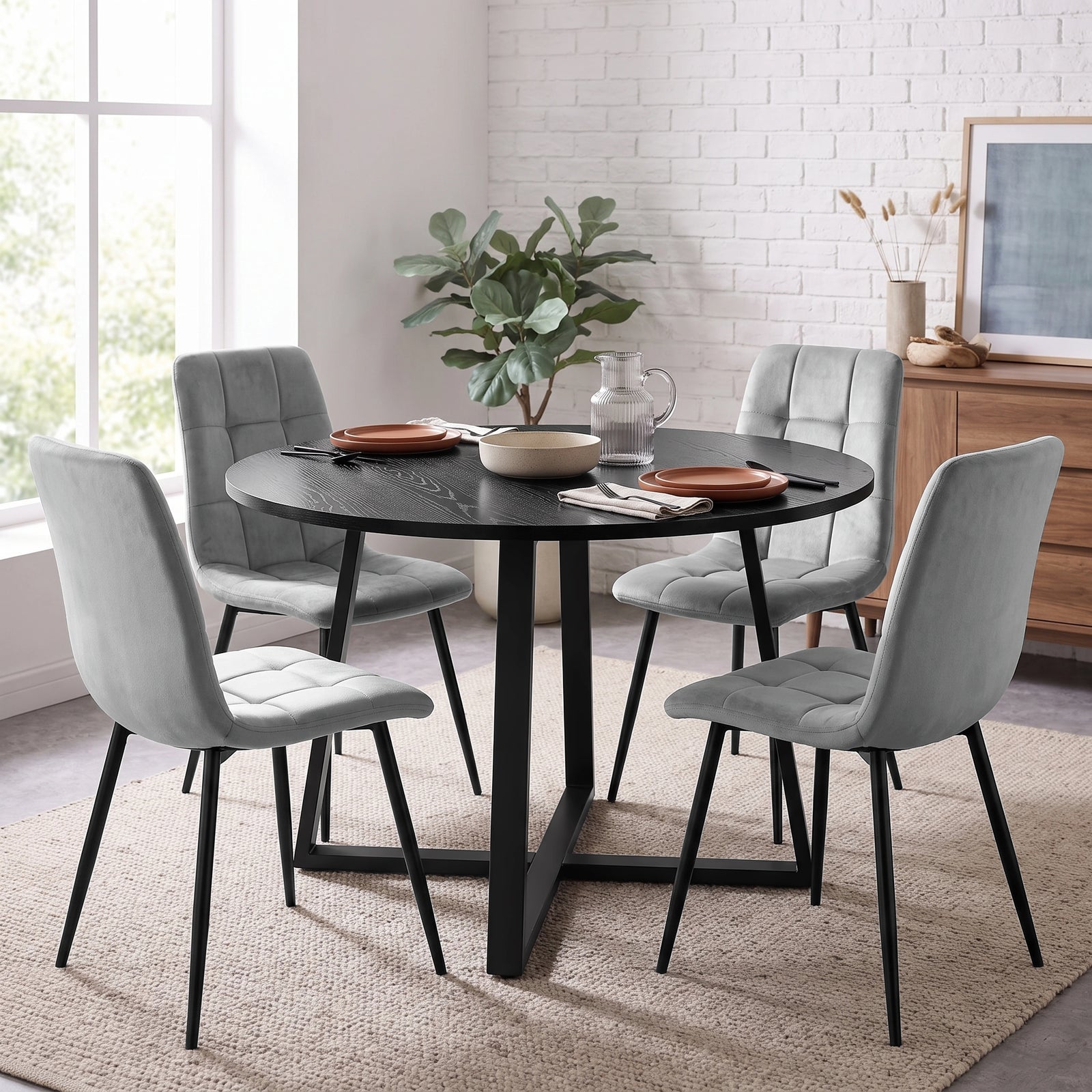 [Light Grey | Black Wood] Kyvon round dining table set in bright kitchen dining corner with four light grey velvet chairs