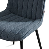 [Vertical Blue | Clear] Close-up of Kyvon blue upholstered fabric channeled stitched chair seat with black metal legs