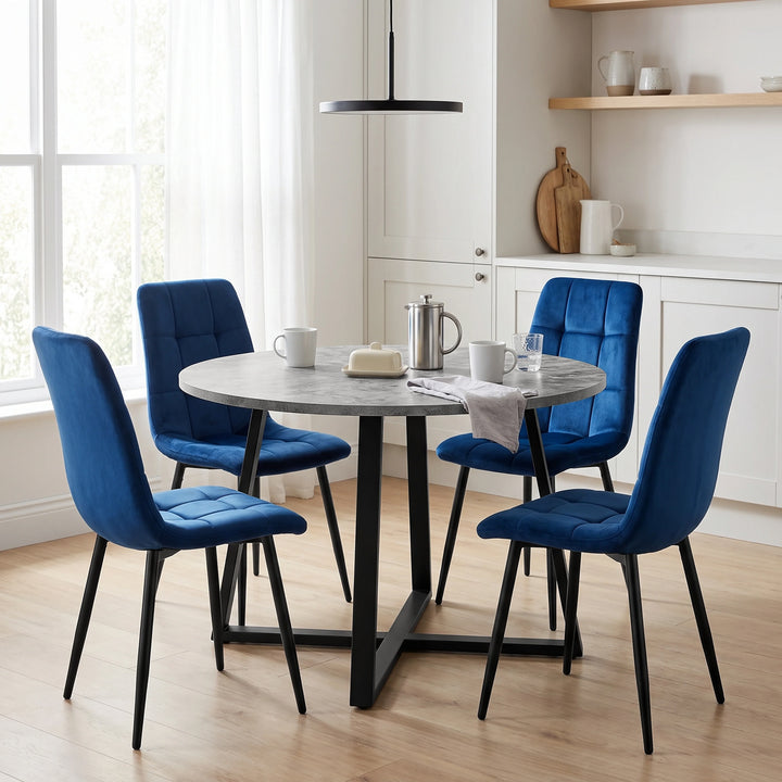 [Blue Velvet] Kyvon round dining table set with 4 blue velvet chairs in a styled room