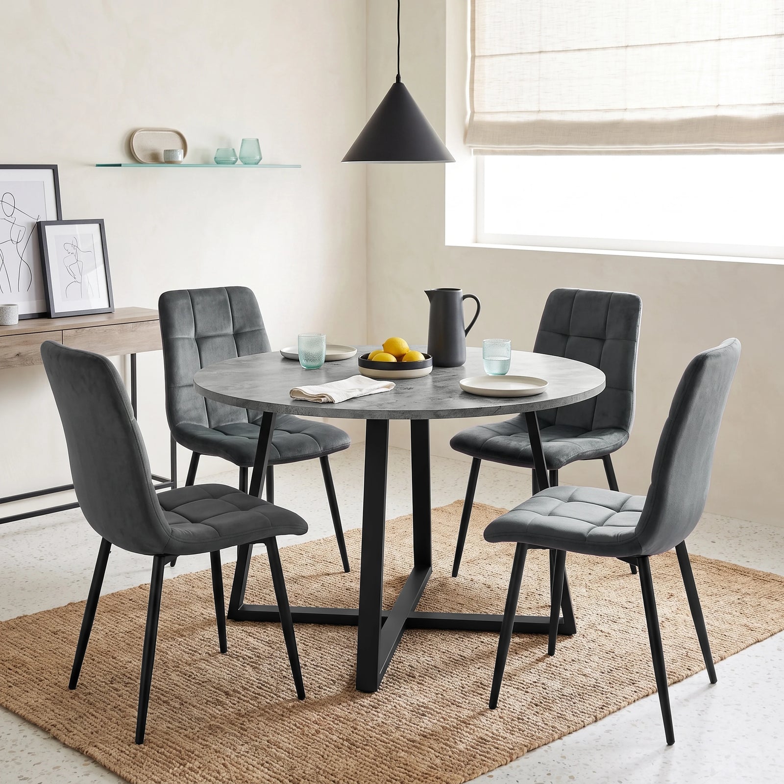 [Dark Grey Velvet] Kyvon round dining table set with 4 dark grey velvet chairs in a dining room