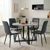 [Dark Grey Velvet] Kyvon round dining table set with 4 dark grey velvet chairs in a styled dining space