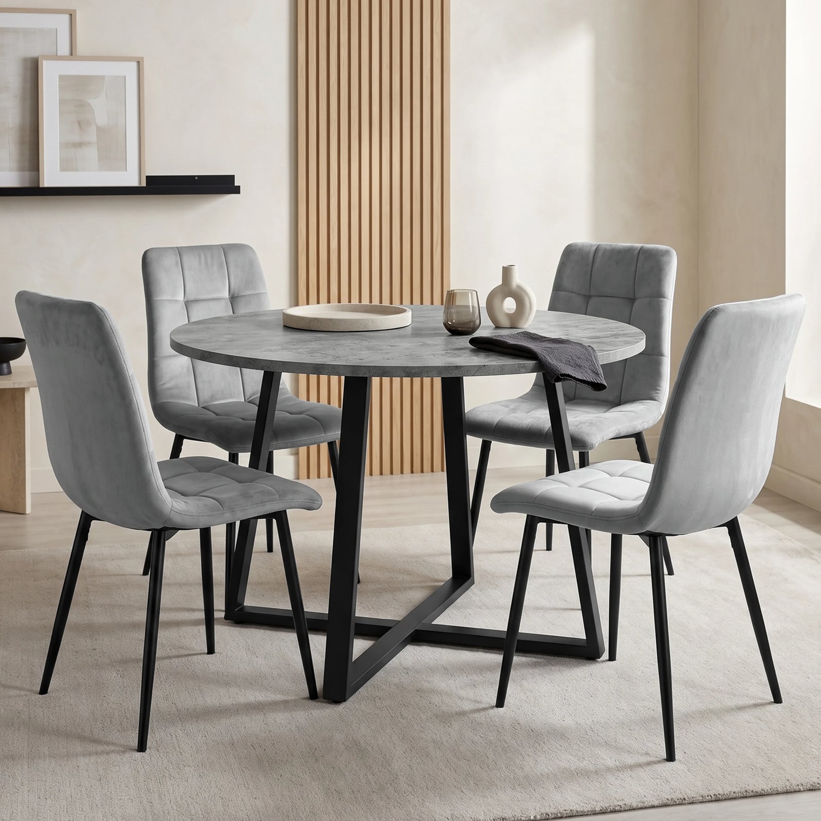 [Light Grey Velvet] Kyvon round dining table set with 4 light grey velvet chairs in a styled dining space