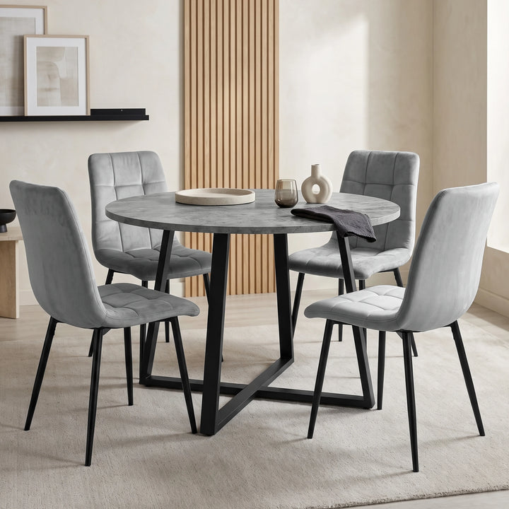 [Light Grey Velvet] Kyvon round dining table set with 4 light grey velvet chairs in a styled dining space