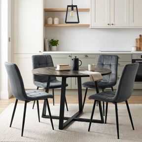 [Dark Grey | Dark Wood] Kyvon round dining table set with 4 dark grey velvet chairs in a kitchen dining space