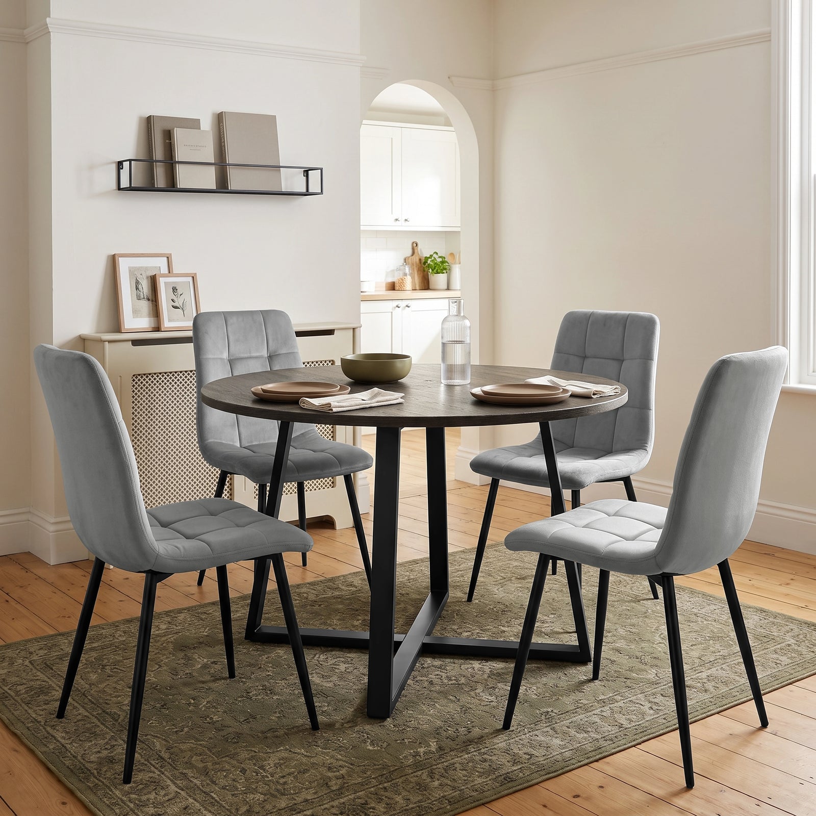 [Light Grey | Dark Wood] Kyvon round dining table set with 4 light grey velvet chairs in a bright dining room