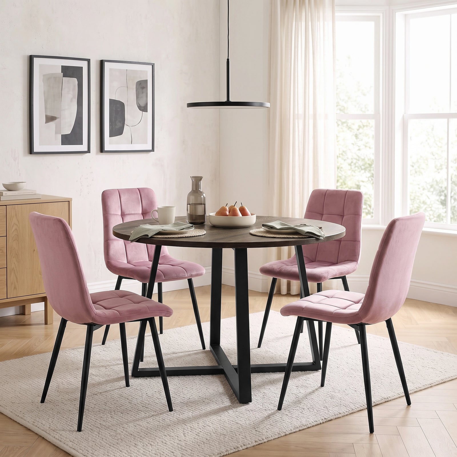[Pink | Dark Wood] Kyvon round dining table set with 4 pink velvet chairs in a bright dining room