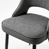 [Grey | Clear] Close-up of Kyvon 4-seater grey upholstered fabric comfy curve chair seat with black metal legs