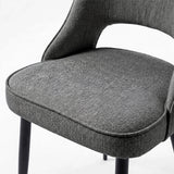 [Grey] Close-up of Kyvon 4-seater grey upholstered fabric comfy curve chair seat with black metal legs