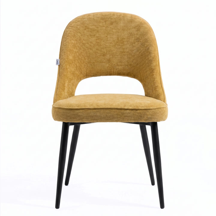 [Mustard | Tinted] Kyvon mustard upholstered fabric comfy dining chair front view with black metal legs