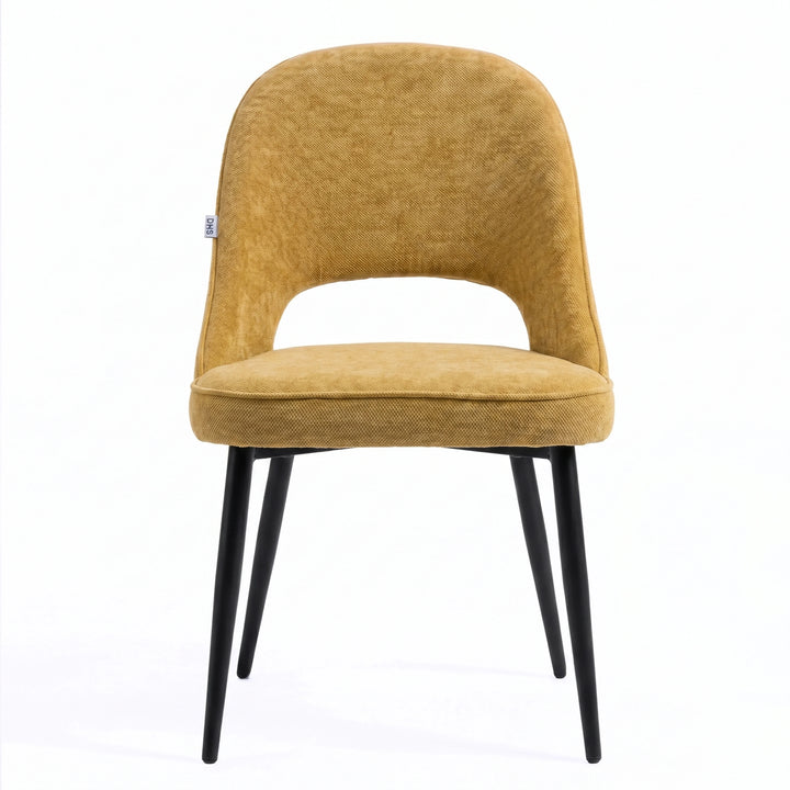 [Mustard | Tinted] Kyvon mustard upholstered fabric comfy dining chair front view with black metal legs