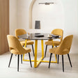 [Mustard | Tinted] Kyvon 4 seater round glass dining set with Tinted tabletop, gold legs and mustard chairs in a dining room