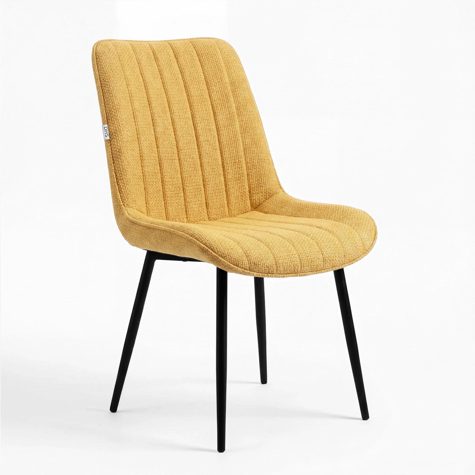 [Vertical Mustard | Clear] Kyvon mustard upholstered fabric channeled stitched dining chair angled view with black legs
