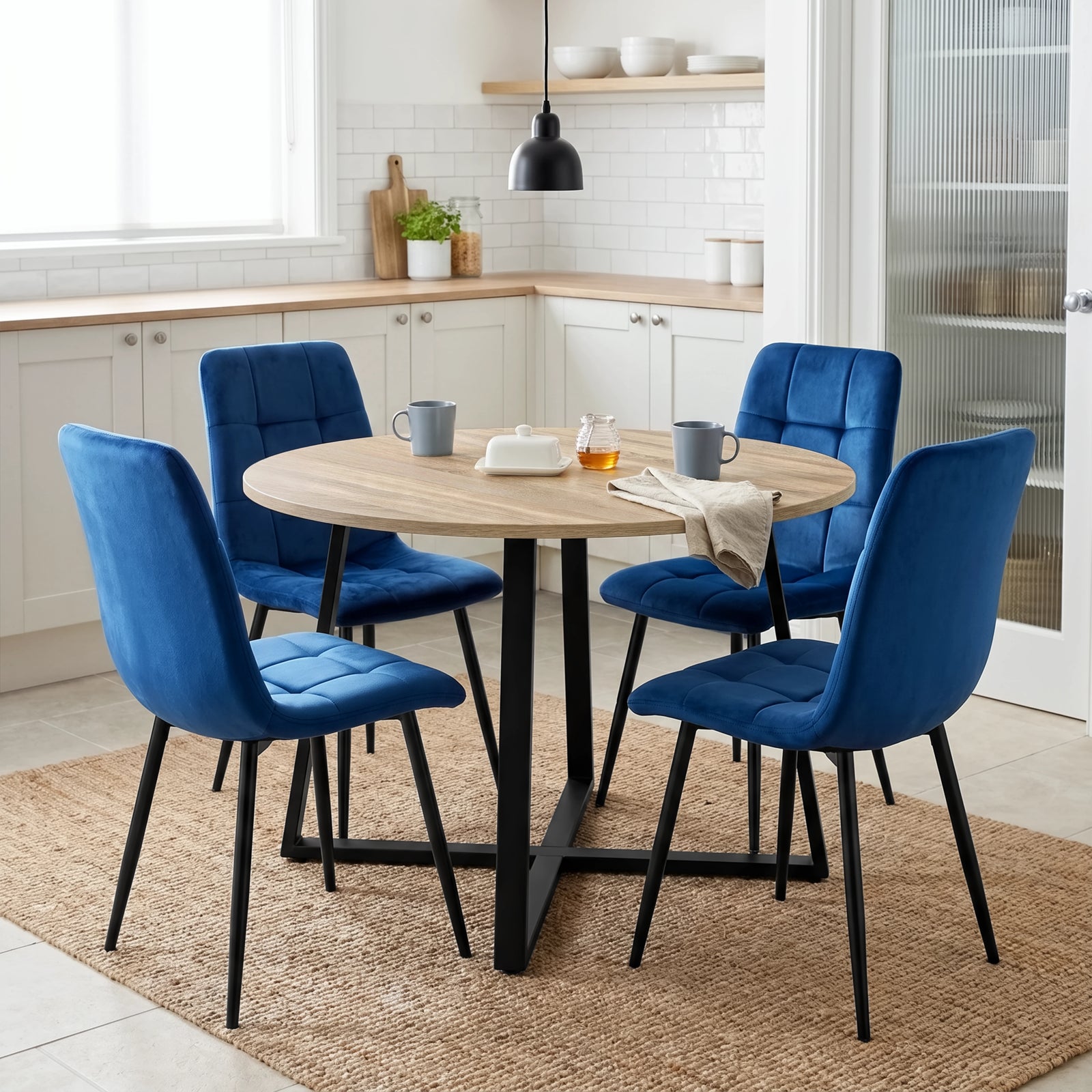 [Blue | Sonoma Oak] Kyvon round dining table set with 4 blue velvet chairs in a styled room