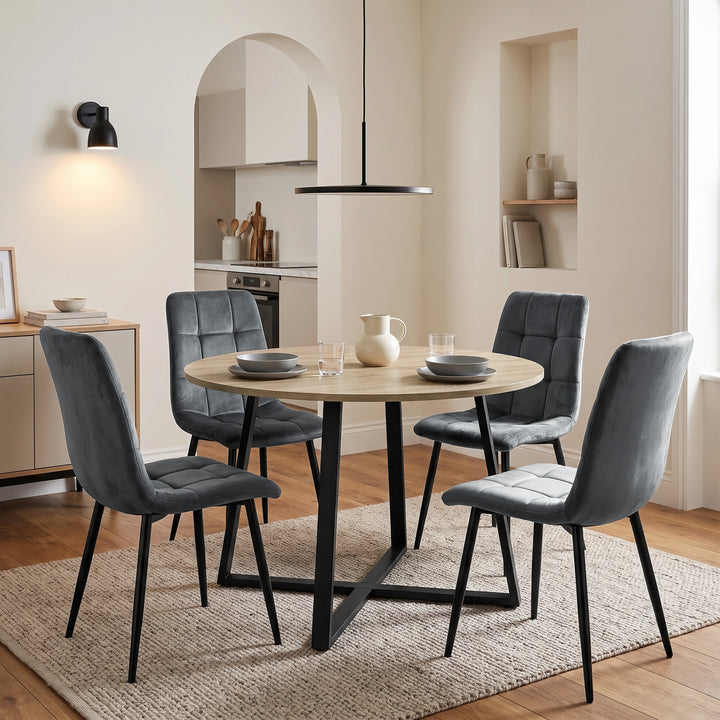 [Dark Grey | Sonoma Oak] Kyvon round dining table set with 4 dark grey velvet chairs in a styled room