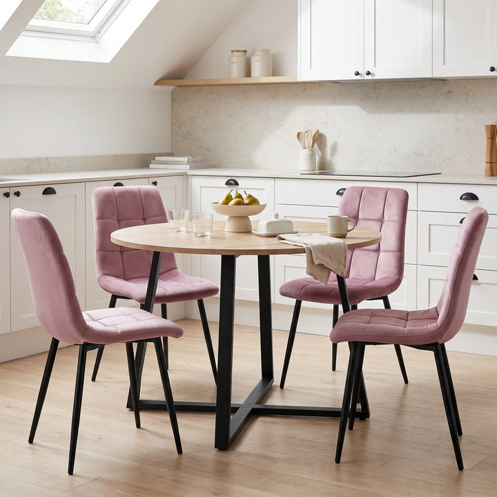 [Pink | Sonoma Oak] Kyvon round dining table set with 4 pink velvet chairs in a styled room