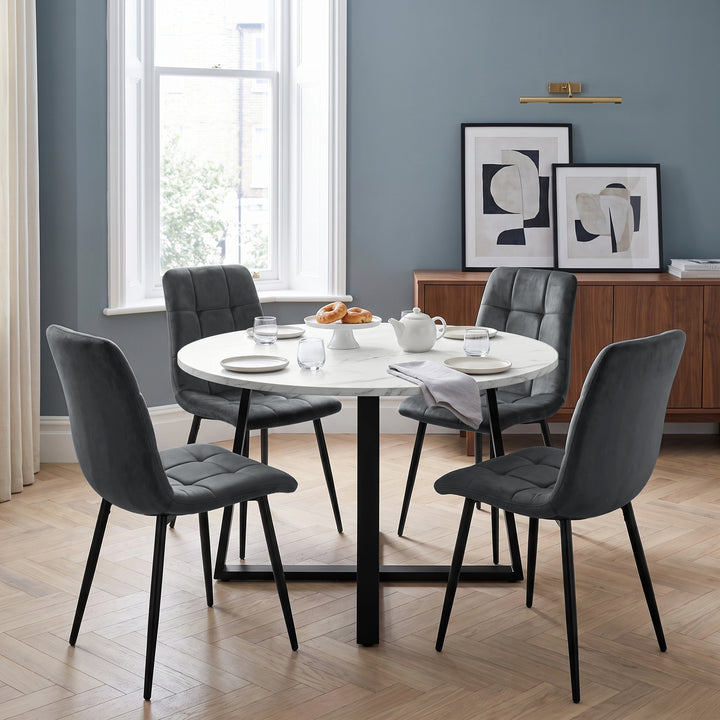 [Dark Grey | White Marble] Kyvon round dining table set with 4 dark grey velvet chairs in a dining room