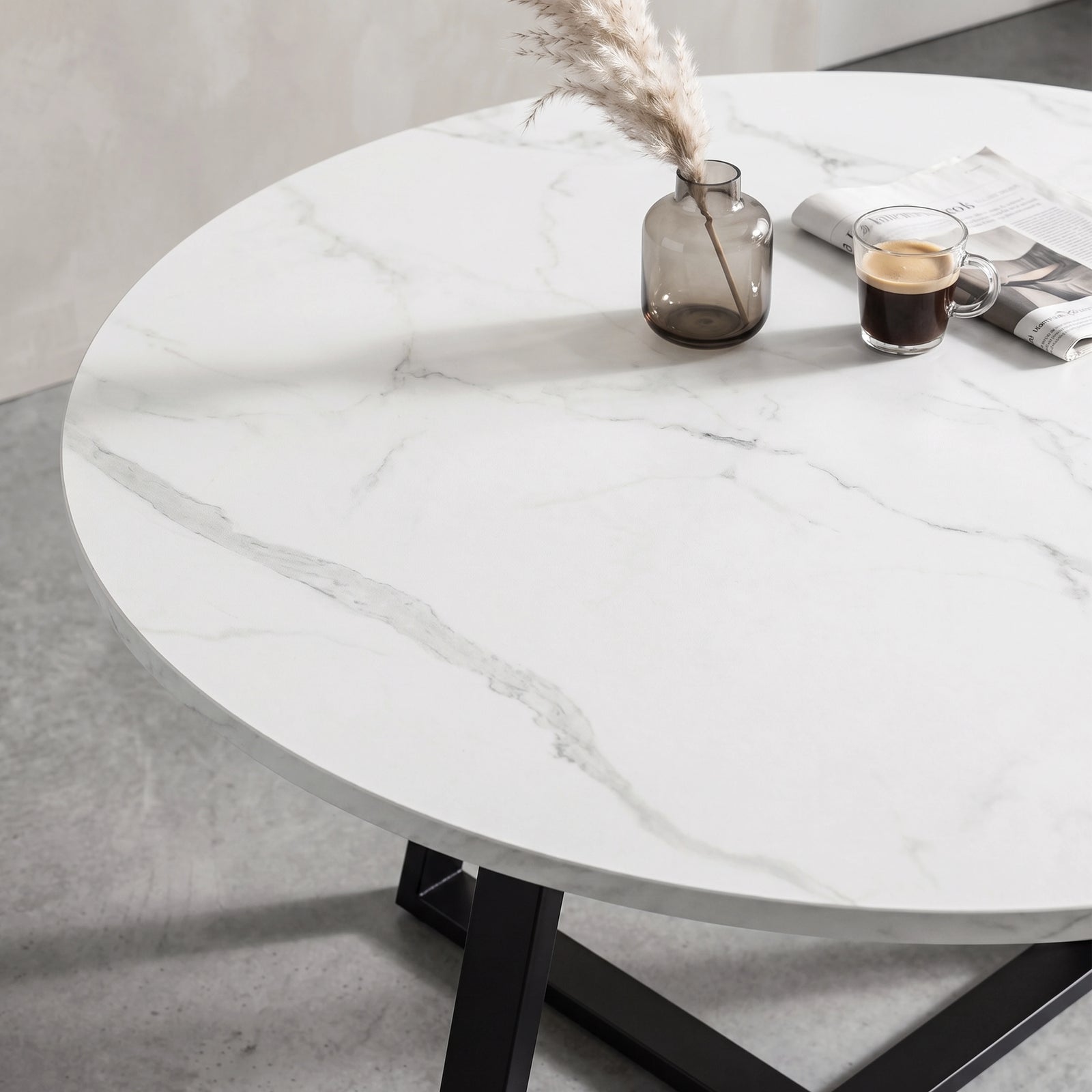 [Grey | White Marble] Close-up of Kyvon round dining table set's white marble-effect tabletop and black base