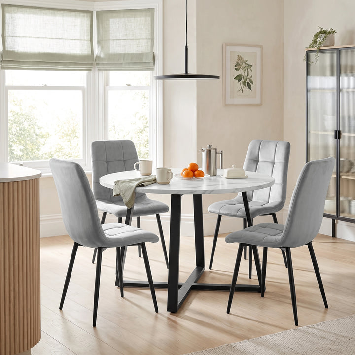 [Light Grey | White Marble] Kyvon round dining table set with 4 light grey velvet chairs in a dining room