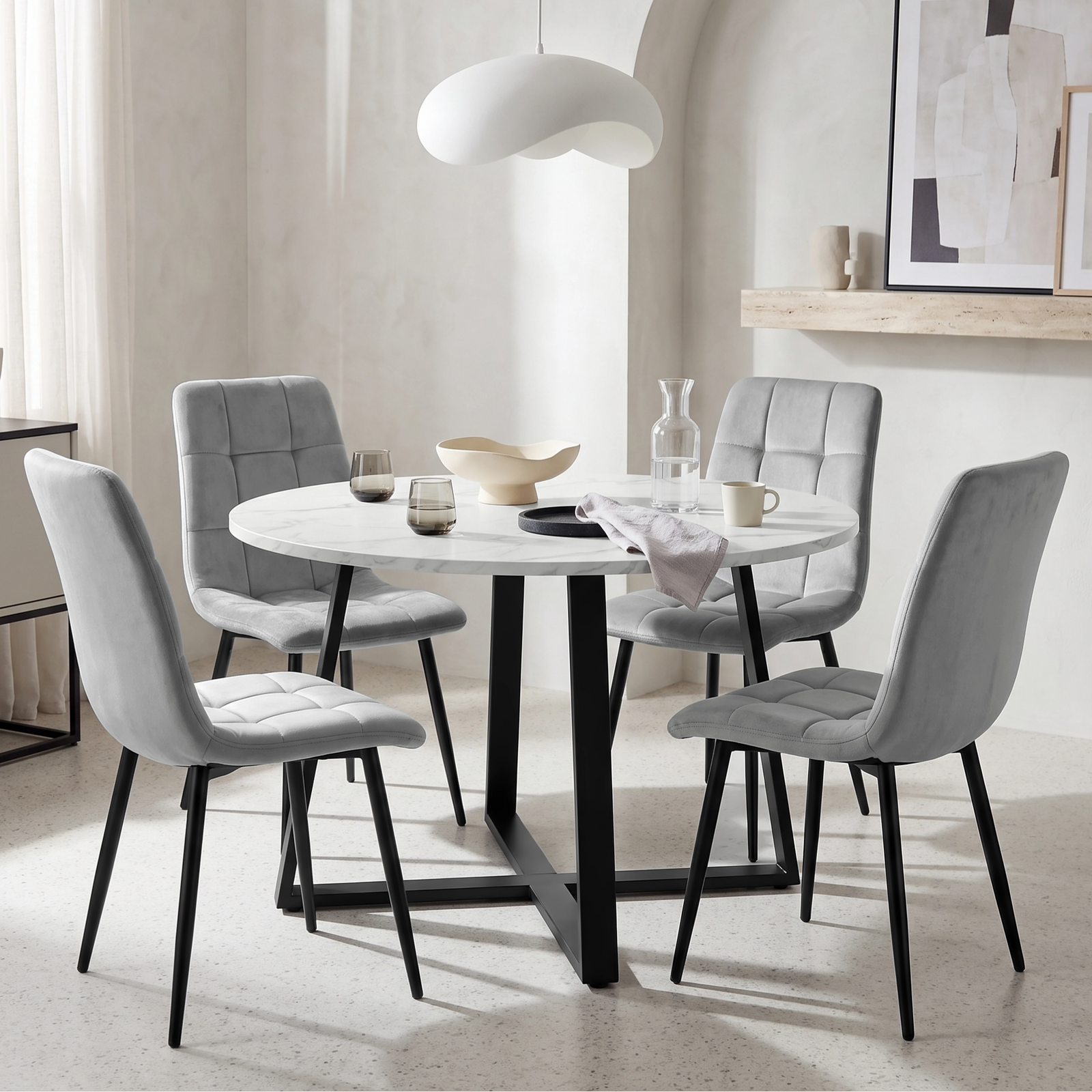 [Light Grey | White Marble] Kyvon round dining table set with 4 light grey velvet chairs in a styled room