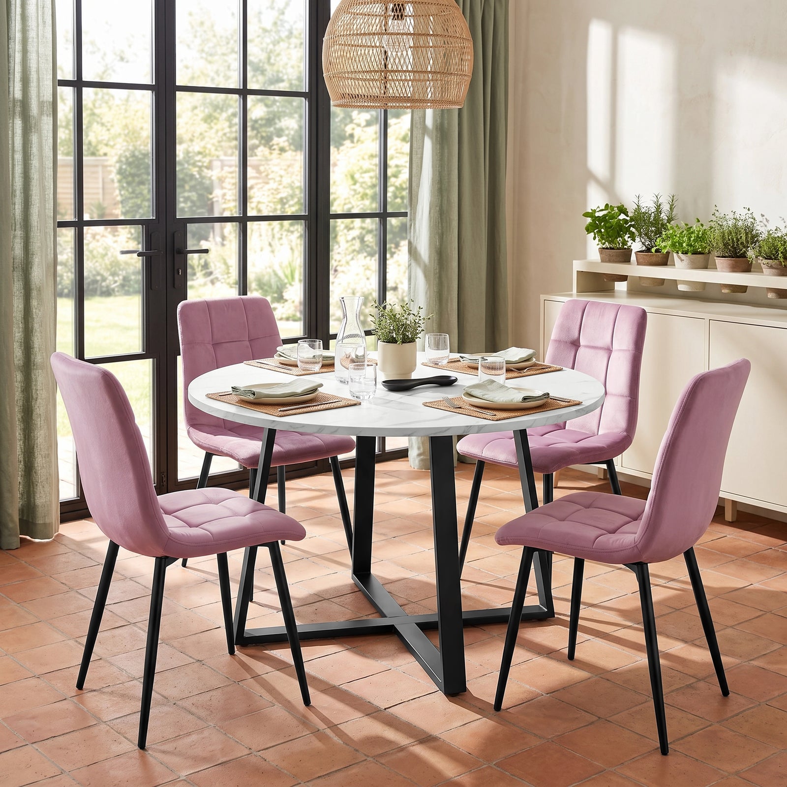 [Pink | White Marble] Kyvon round dining table set with 4 pink velvet chairs in a dining room