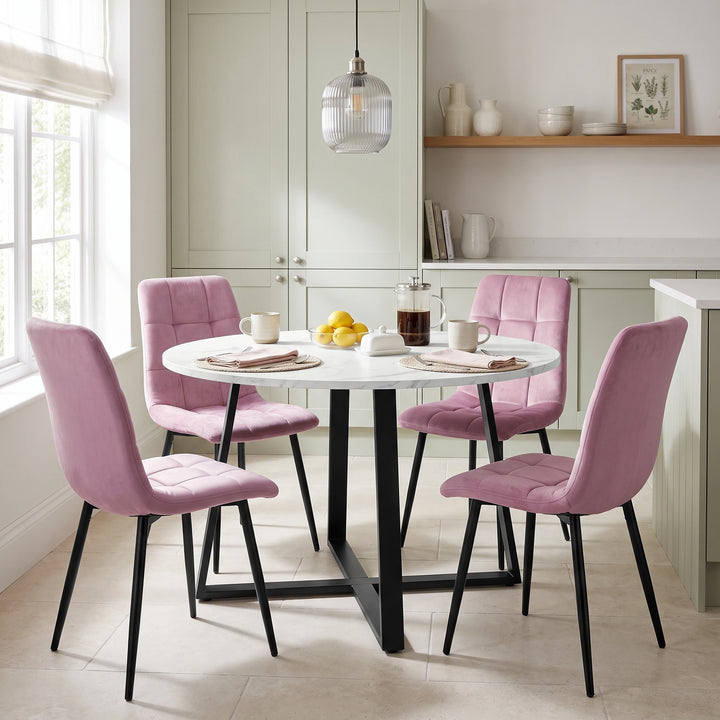 [Pink | White Marble] Kyvon round dining table set with 4 pink velvet chairs in a styled room