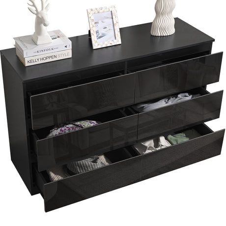 Large chest of drawers black, providing ample storage with a stylish and modern design.