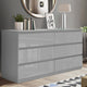 Large grey chest of drawers with spacious storage, ideal for modern bedroom organization.