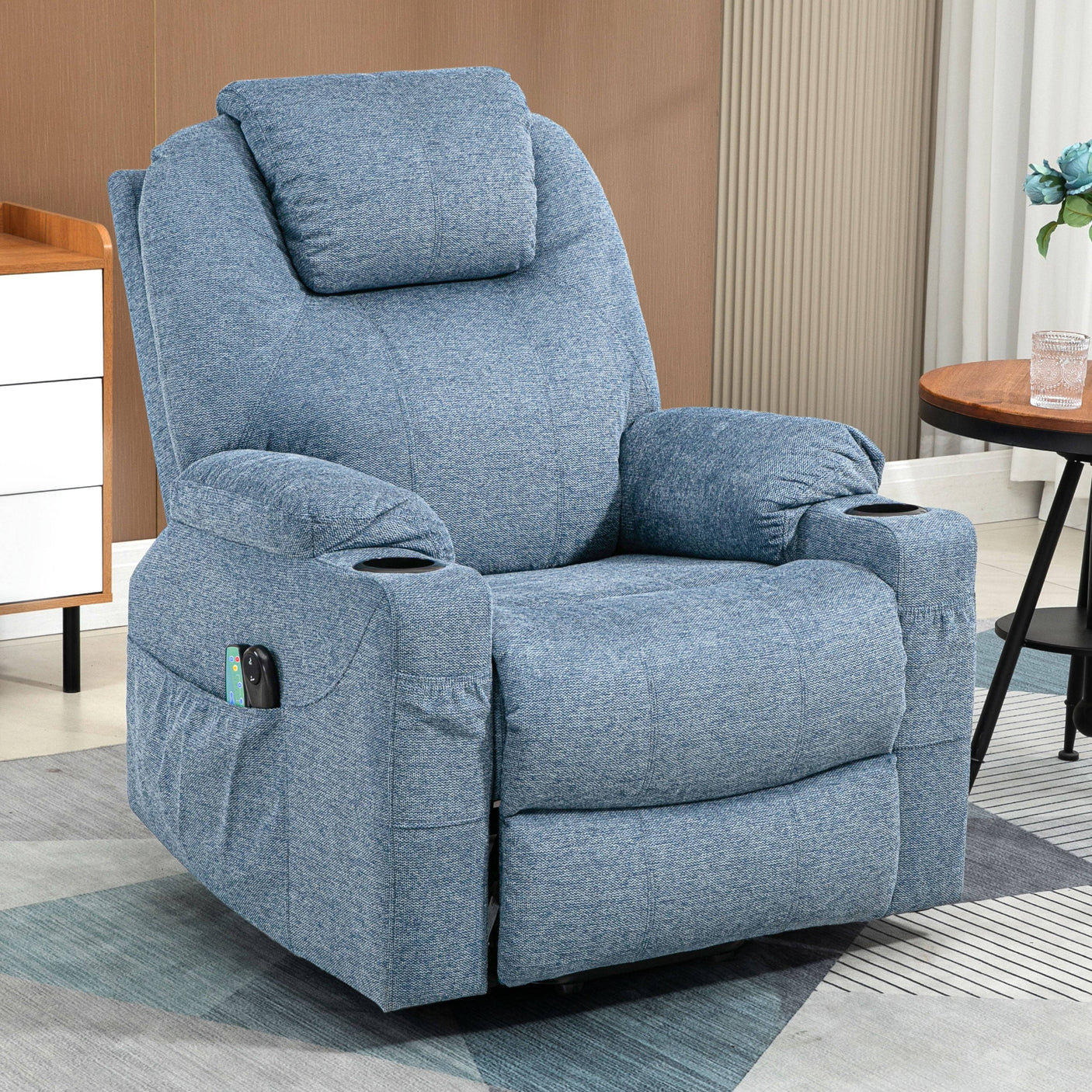 Blue electric recliner armchair with cup holders and side pocket, ideal for elderly or home comfort seating.