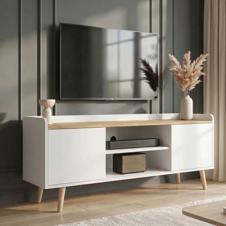 [White | 112 cm] Larvik White TV Unit with Storage 112cm Oak Top positioned against a dark grey panelled wall under a television, adorned with a vase of pampas grass and audio equipment