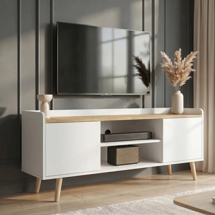 [White | 112 cm] Larvik White TV Unit with Storage 112cm Oak Top positioned against a dark grey panelled wall under a television, adorned with a vase of pampas grass and audio equipment