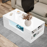 White coffee table with decorative items in a living room setting