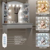 Dressing Table With Mirror & LED Lights - Makeup Vanity Desk in grey with adjustable brightness and 3 light modes: warm, natural, and cool. Features 1 large drawer, 5 storage shelves, and a remote control for light settings.