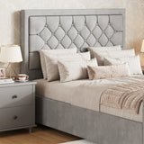 Light grey double storage bed with cross-puffed headboard positioned next to a modern bedside table