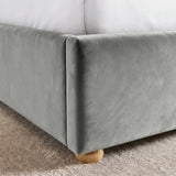 [Double | Light Grey] Close-up of upholstered footboard corner, side rail seam, velvet surface and rounded wooden foot
