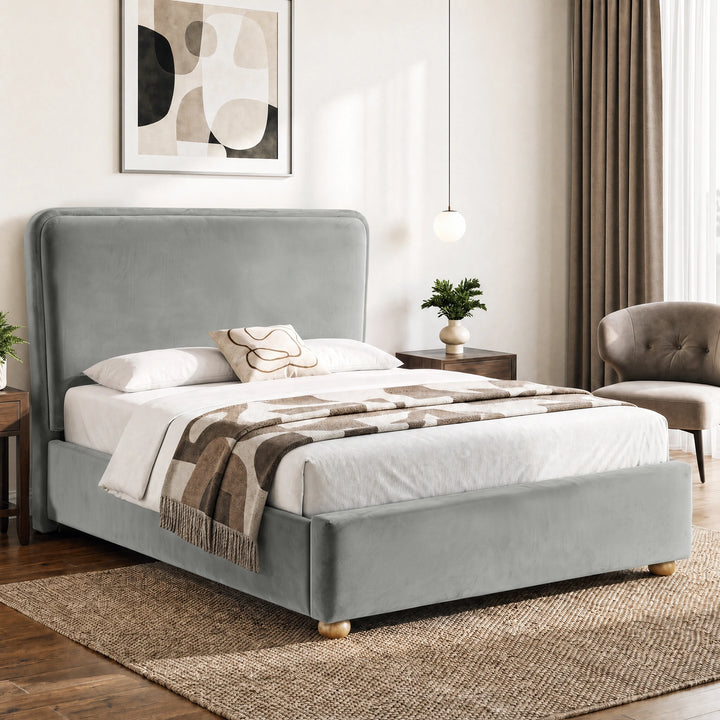 [Double | Light Grey] Three-quarter bedroom view showing tall padded headboard, low footboard, bedding and wooden feet