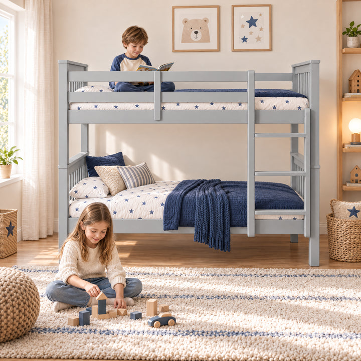 [Grey] Bedroom scene showing a child reading on the upper bunk, another playing on a rug, bedding, guard rails, and ladder.