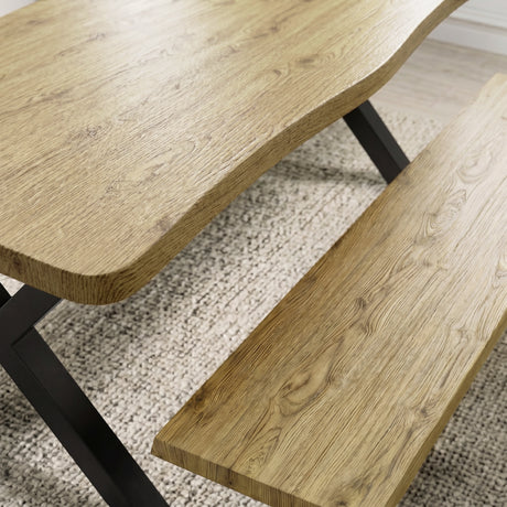 [Light Oak] Crosswick Dining Table with Benches close-up showing live-edge oak wood grain texture and matching bench on a soft woven rug