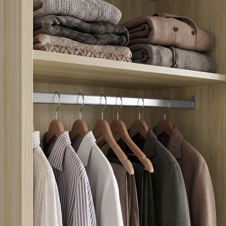 [Light Oak] Torvek interior shelf detail with folded knitwear, hanging rail, wooden hangers, and clothes.