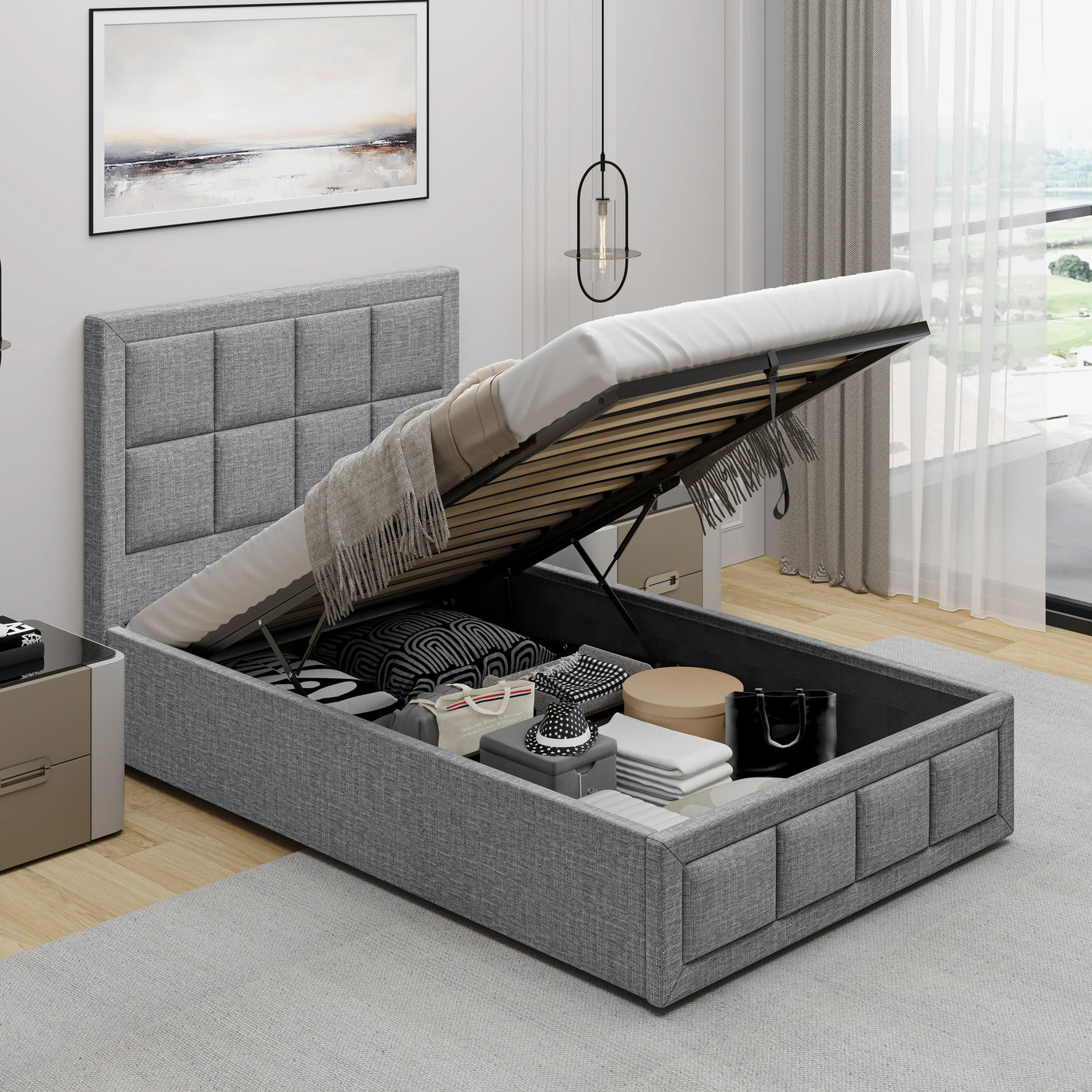 Light grey Single Ottoman Storage Bed with gas lift mechanism raised to reveal spacious under-bed storage for linens, clothes, and accessories.